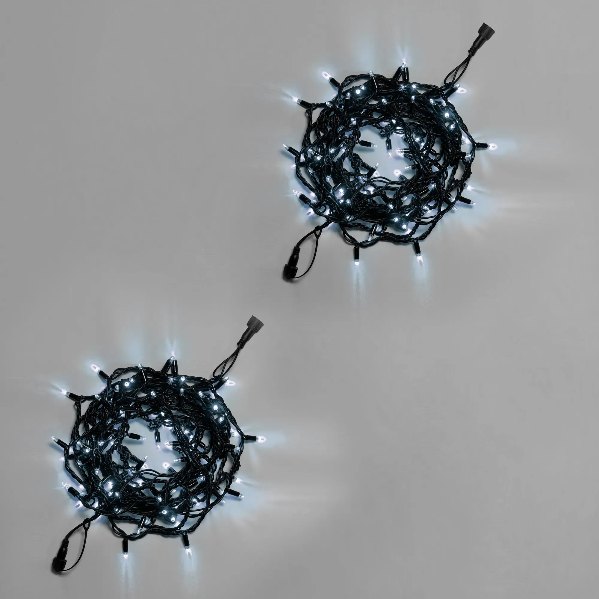 girljanda-nit-10-m-5-5-belaja-220-v-100-led-provod-chernyj-kauchuk-3-3-mm-ip65