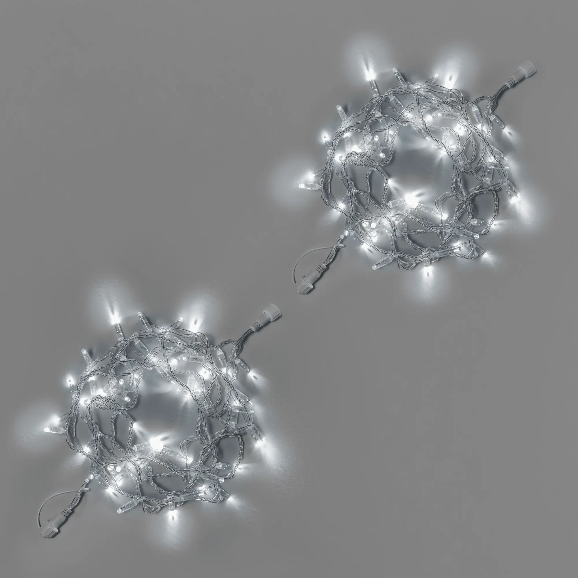 girljanda-nit-10-m-5-5-belaja-mercajushhaja-220-v-100-led-provod-prozrachnyj-pvh-2-3-mm-ip65