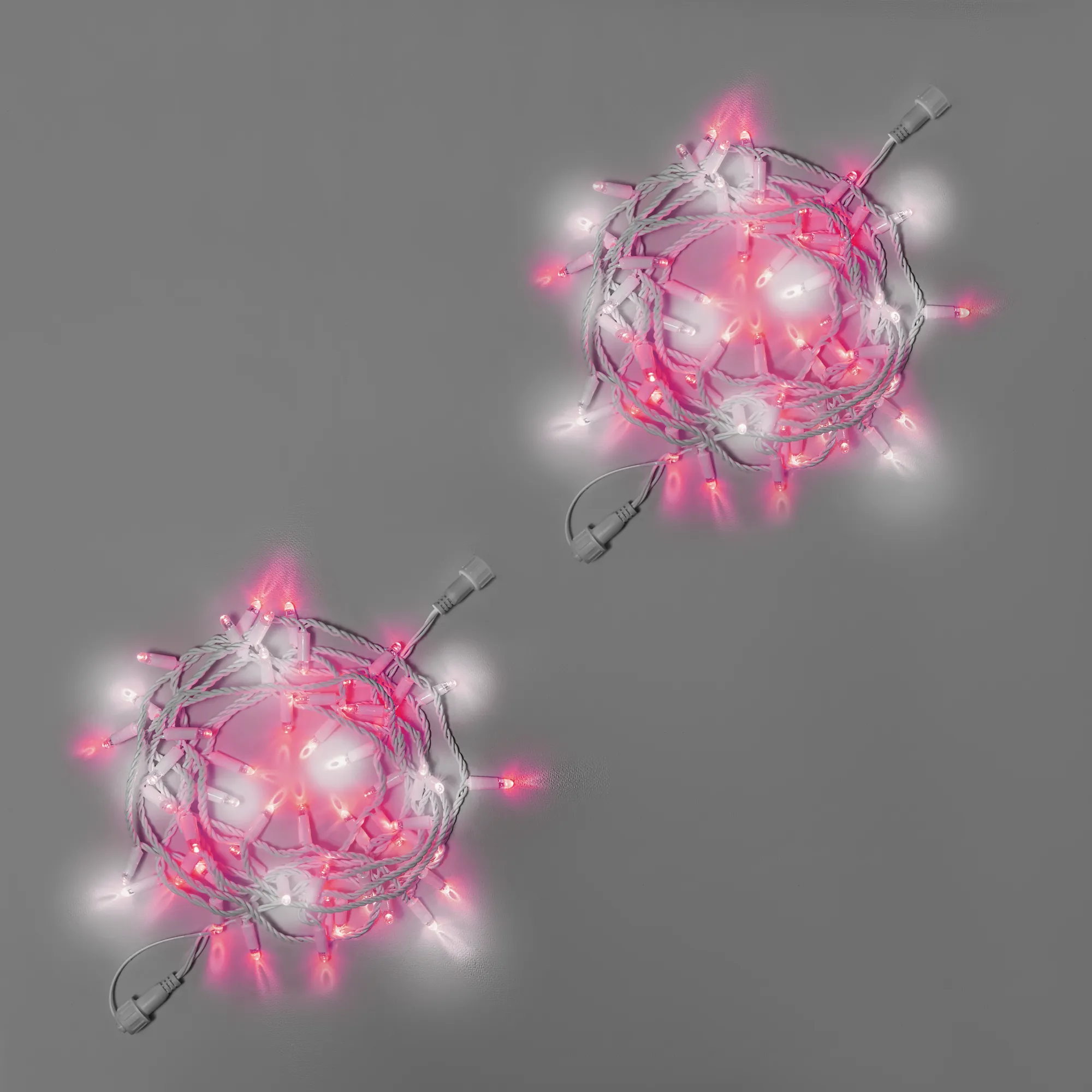 girljanda-nit-10-m-5-5-rozovaja-mercajushhaja-220-v-100-led-provod-belyj-kauchuk-2-3-mm-ip65