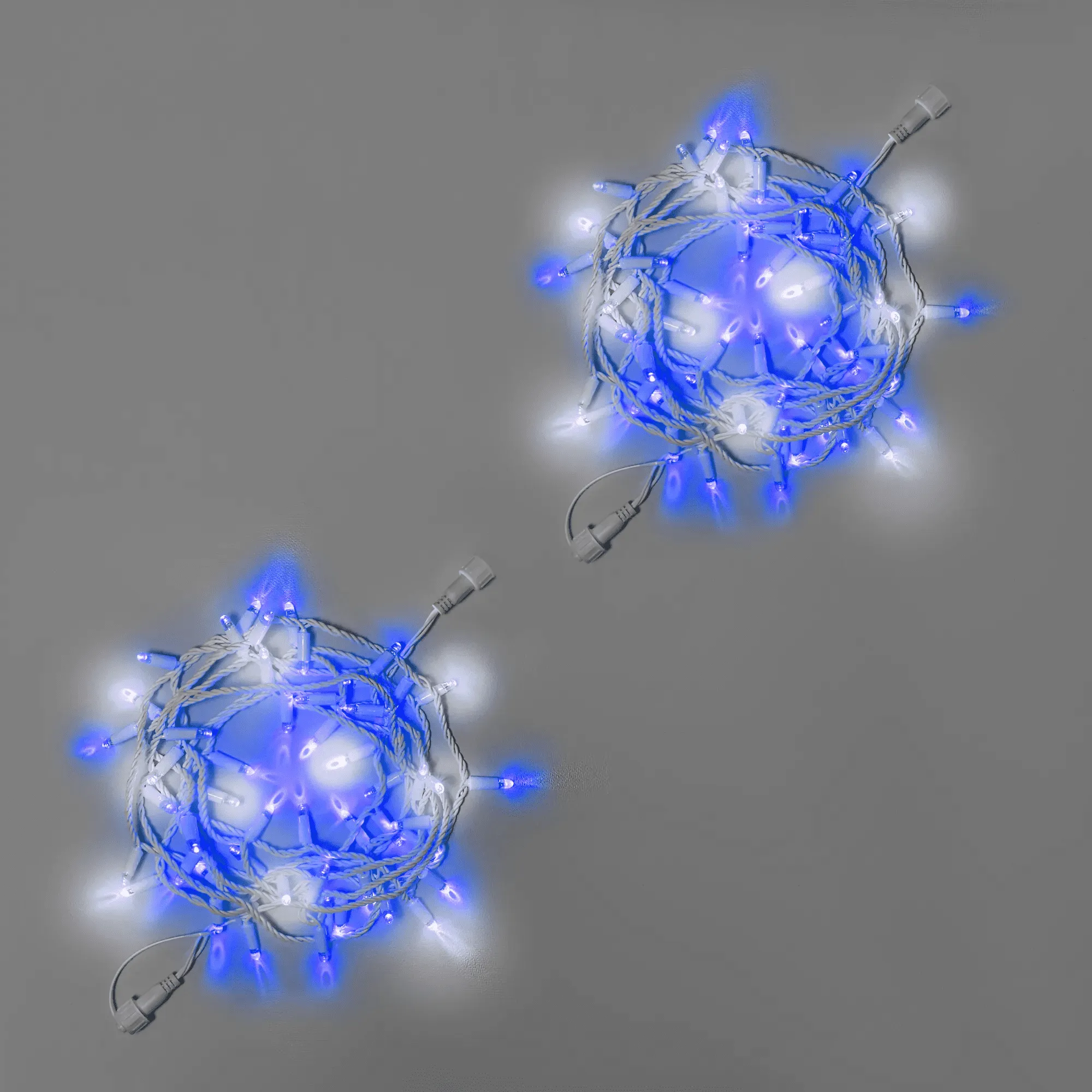 girljanda-nit-10-m-5-5-sinjaja-mercajushhaja-220-v-100-led-provod-belyj-kauchuk-3-3-mm-ip65