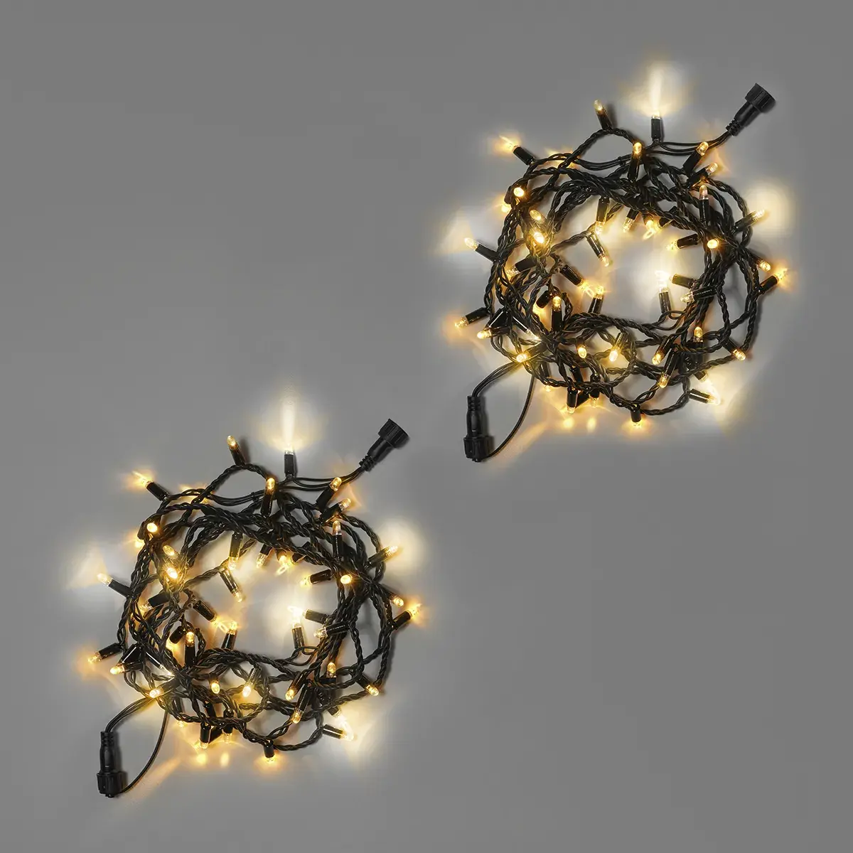 girljanda-nit-10-m-5-5-teplaja-belaja-mercajushhaja-tjoplym-belym-220-v-100-led-provod-chernyj-kauchuk-2-3-mm-ip65