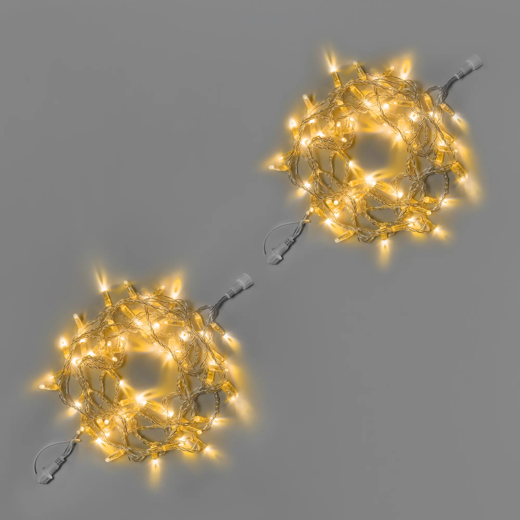 girljanda-nit-10-m-5-5-zheltaja-220-v-100-led-provod-prozrachnyj-pvh-2-3-mm-ip65