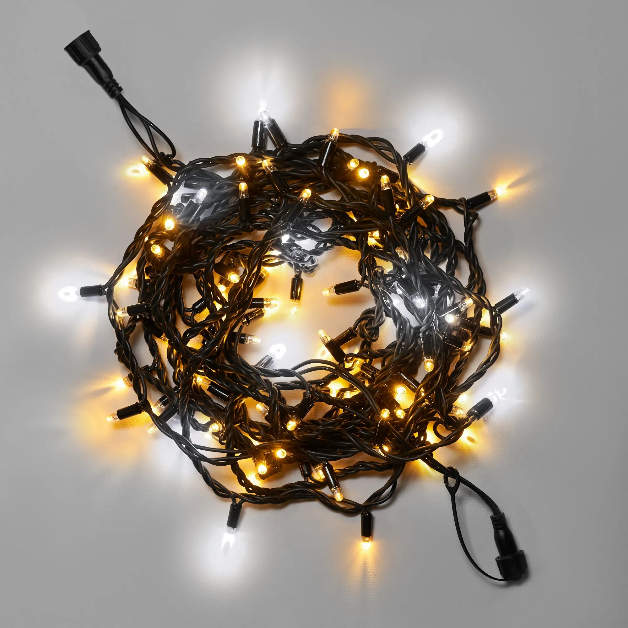 girljanda-nit-10-m-teplyj-belyj-mercajushhaja-24-v-100-led-provod-chernyj-kauchuk-3-3-mm-ip65